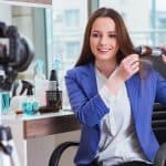 Beauty fashion blogger and hair stylist recording video on social media